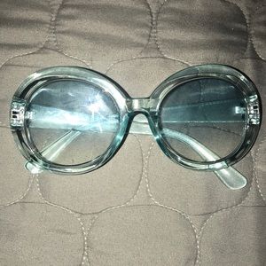 clear blue circled glasses